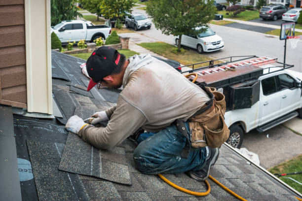Professional Roof Installation technician working in Woodville, MA